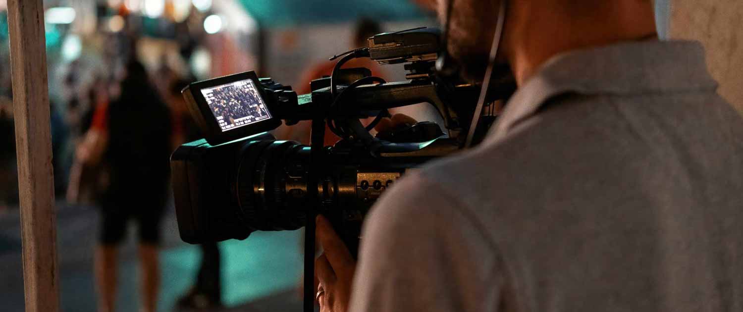 professional cameraman recording