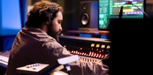 audio engineer working recording editing new music studio